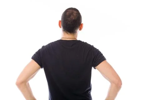 Model isolated on plain background back hands on hips Stock Photos