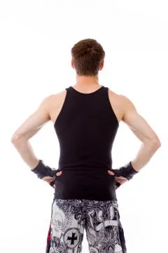 Model isolated on plain background back hands on hips Stock Photos