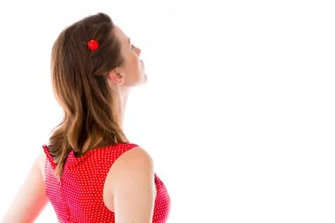 Model isolated on plain background back looking behind Foto stock