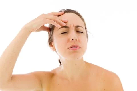 Model isolated on plain background confused headache Stock Photos