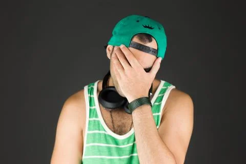 Model isolated on plain background confused headache Stock Photos