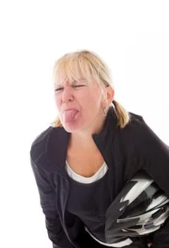 Model isolated on plain background face sticking tongue out Stock Photos