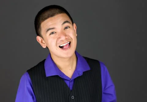 Model isolated on plain background face sticking tongue out Stock Photos