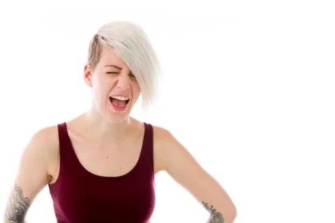 Model isolated on plain background furious screaming Stock Photos