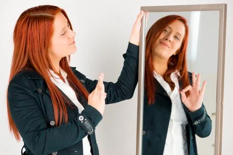 Model isolated on plain background hand gesture ok sign Stock Photos