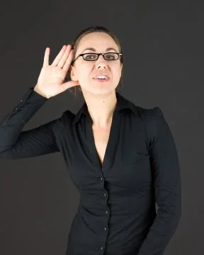 Model isolated on plain background listening paying attention Stock Photos