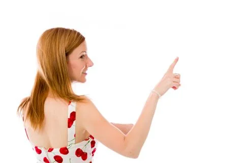 Model isolated on plain background looking at camera pointing Stock Photos