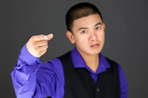 Model isolated on plain background nagging scolding with finger Stock Photos