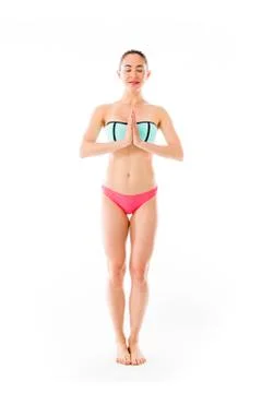 Model isolated on plain background praying wishing Stock Photos