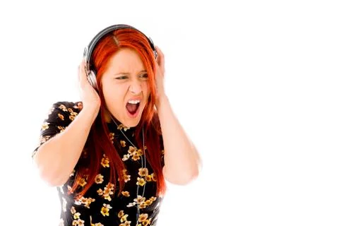 Model isolated on plain background stressed upset pulling hairs Stock Photos