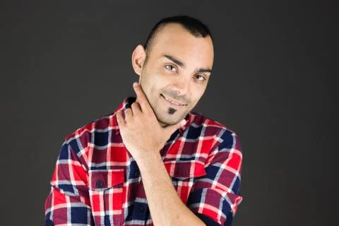 Model isolated on plain background thinking Stock Photos