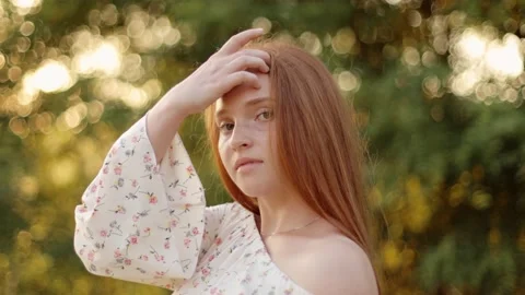Model, look at the camera, touches her hair Stock Footage 235032715