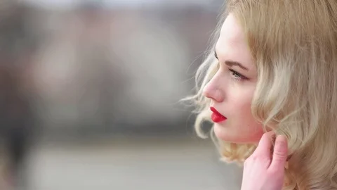 Model Looking into the Camera Stock Footage 73034702