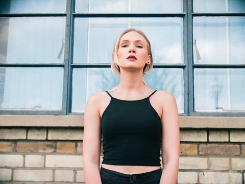 Model looking through the lens Stock Photos