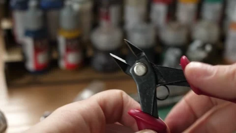 Model, modeling, nippers, wire cutters, painting minis, miniatures for rpg game Stock Footage 260822290