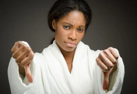 Model negative thumbs down Stock Photos