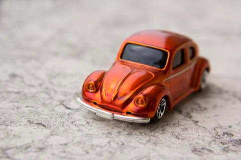 Model of old orange car Stock Photos