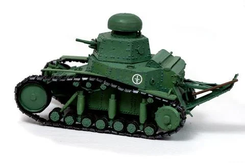 Model of the old Soviet tank of paper on a white background. Look in the ba.. Stock Photos