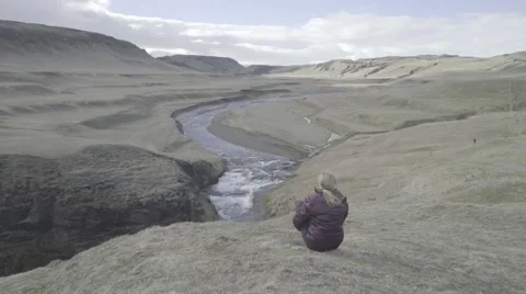 Model Overlooking Beautiful Icelandic Grassy Landscape Stock-Footage 56451736