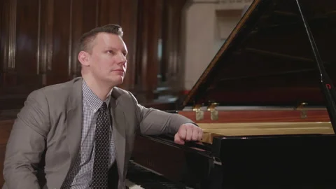 Model Pianist Smiling and Posing Classical Black Piano, Sliding Shot Video stock 144711319