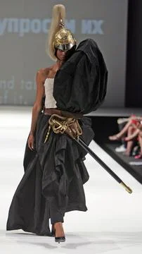 A Model Is Pictured Wearing Dramatic Creation On The Runway During Emma Griffith Stock Photos