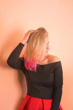Model on pink background. Party time of stylish women.  Romantic portrait of  Fotos Stock