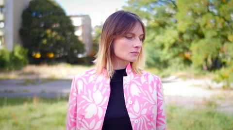 Model with pink dress posing looking in camera and smiling Stock Footage 59737031