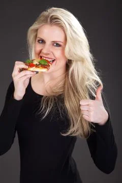 Model with pizza Foto stock