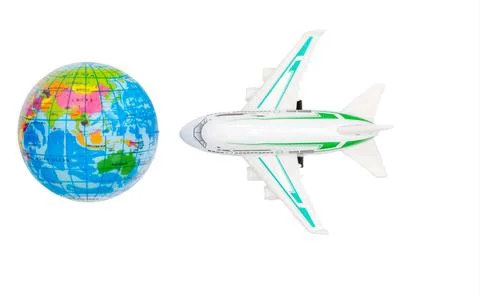 Model plane circling globe. White background. Stock Photos
