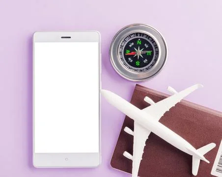 Model plane, compass and modern smart mobile phone 스톡 사진
