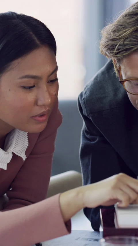 Model, planning and talking with architect people in office together for Stock Footage 329842053