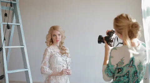 Model pose to photographer in studio Video stock 60837252