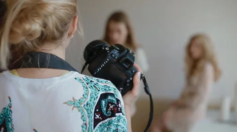 Model pose to photographer in studio Stock Footage 61829219