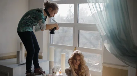 Model pose to photographer in studio Stock Footage 63131804