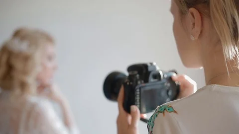 Model pose to photographer in studio Stock Footage 71207187