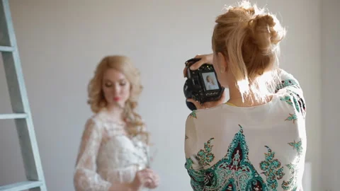 Model pose to photographer in studio Stock Footage 86152014