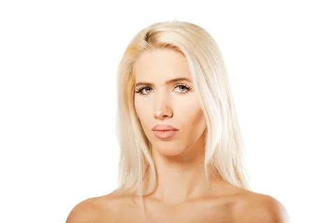 Model poses with a neutral expression showcasing long blonde hair and natural Stock Photos