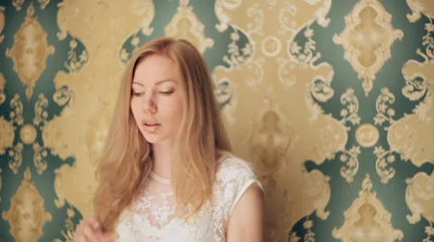 Model poses to photographer in studio Stock Footage 35238869