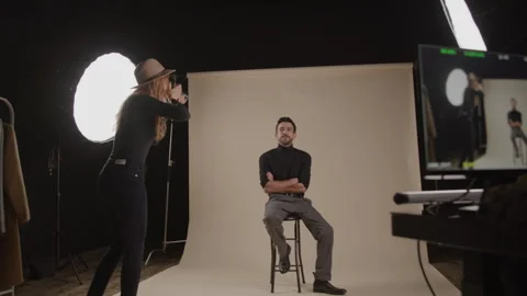 Model Poses For Photographer In Studio Stock Footage 270396481