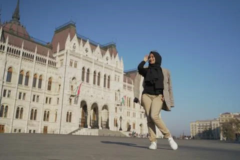 A model posing against a background beautiful city buildings of budapest wit Stock Photos