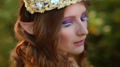 Model posing with a little girl on the nature Stock Footage 55154902