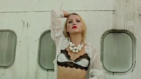 Model posing near airplane Stock Footage 62634484