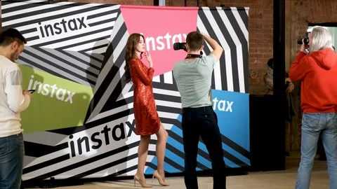 Model posing for photographers Stock Footage 104899621