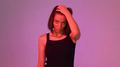 Model posing on pink background Stock Footage 146194314