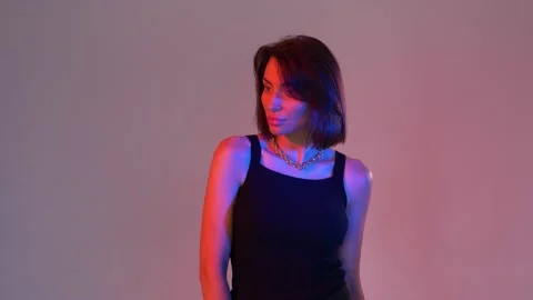 Model posing on pink background Stock Footage 146194971