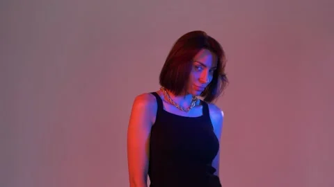 Model posing on pink background Video stock 146195003