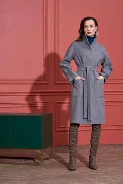 Model posing in studio in trendy clothes Stock Photos