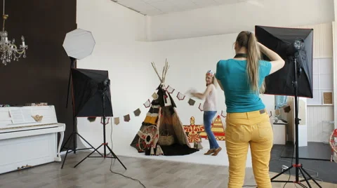 Model posing at wigwam Stock Footage 65367391