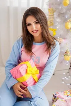Model with present close-up picture Stock Photos