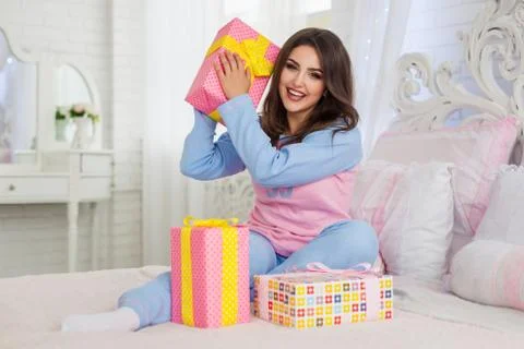 Model with pretty New Year presents 스톡 사진